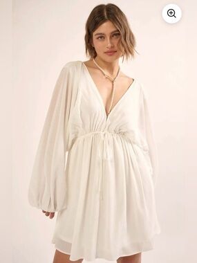 Promesa Ripple Effect Accordion Pleated Flowy V-Neck Long Sleeve Mini Dress